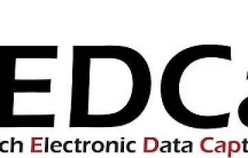 Black text that reads REDCAP: Research Electronic Data Capture, with a red ballcap on top of the R